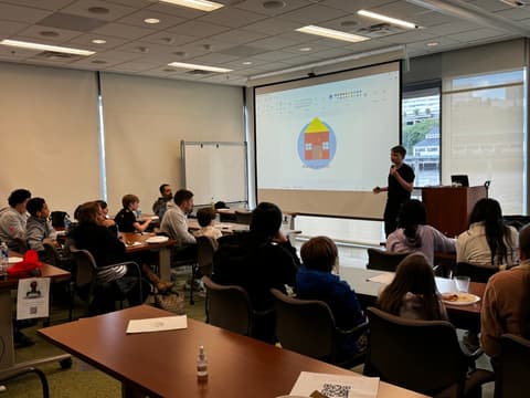 A student uses a simulator as part of a pitch