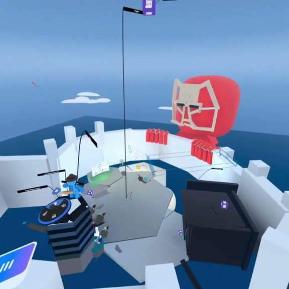 Inside a student-built VR world: floating islands and a giant cat-shaped boss seen through the headset